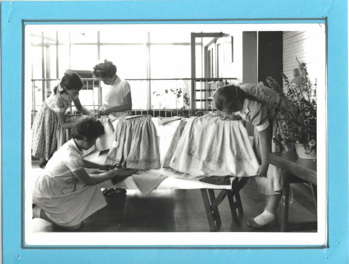 Dress-making class, labelled 1955